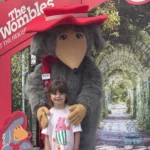 little girl with a womble at height of abraham for may half term