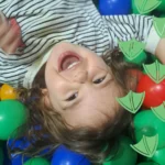 little girl laughing in a Soft Plays In Nottinghamshire