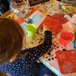 little girl at arts and crafts table at Sorbo Chesterfield