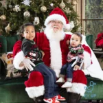 where to see Santa in Nottinghamshire 2025 photo with santa and two kids on his knee