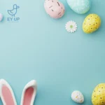 Derbyshire easter events with rabbit ears against a blue background with pastel easter eggs