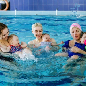 mums at a baby class in derbyshire in the pool with their babies